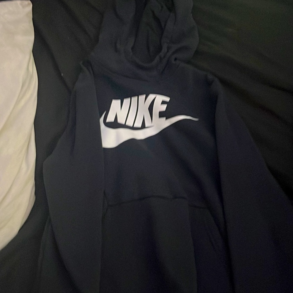 Black Nike pull over sweater, kids size medium